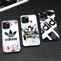 スポーツ ブランド adidas アイフォン13pro max/13proケース 強化ガラス 耐衝撃 アディダス IPHONE13mini/13カバー 人気柄 ストライプ クローバー iPhone12pro/12pro max/12ケース 個性 ファッション 入れ安い iphone11pro max/11pro/11携帯カバーおすあれ  持てる メンズ レディース