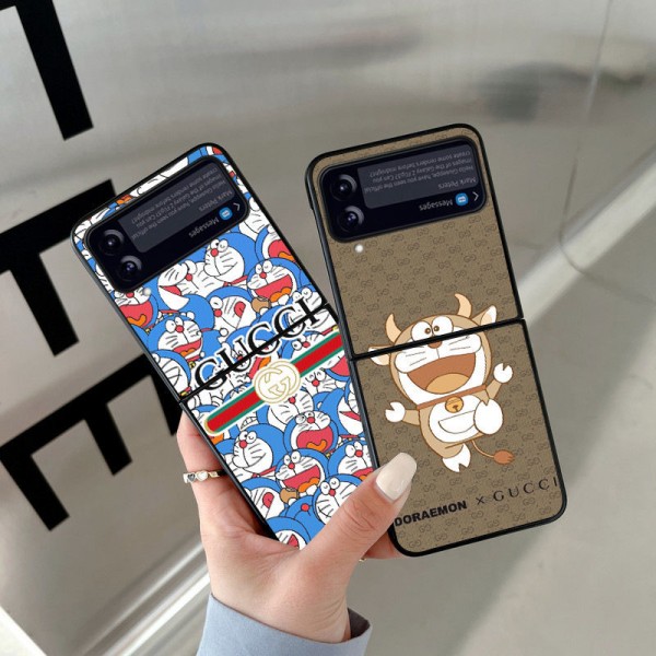 GUCCI ギャラクシーz flip4スマホケース 可愛い漫画柄 グッチ コラボ ドラえもん Galaxy Z Flip3携帯カバー 衝撃吸収 オシャレ Samsung z fold3ケース 軽量 スムーズ フィット 男女兼用